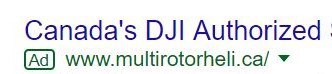 Example showing a paid ad in Google search with an emphasis on the small ad tag that diferentiates paid listings from organic
