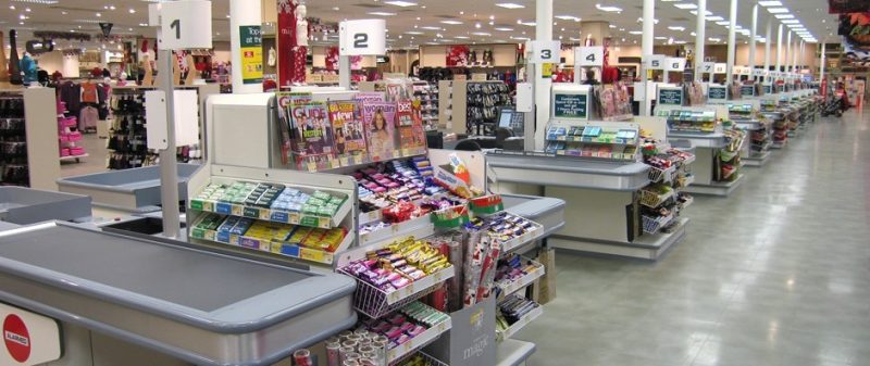 Screenshot of a supermarket checkout counter illustrating upsells at the checkout