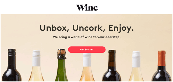 Unbox, Uncork, Enjoy headline on a landing page